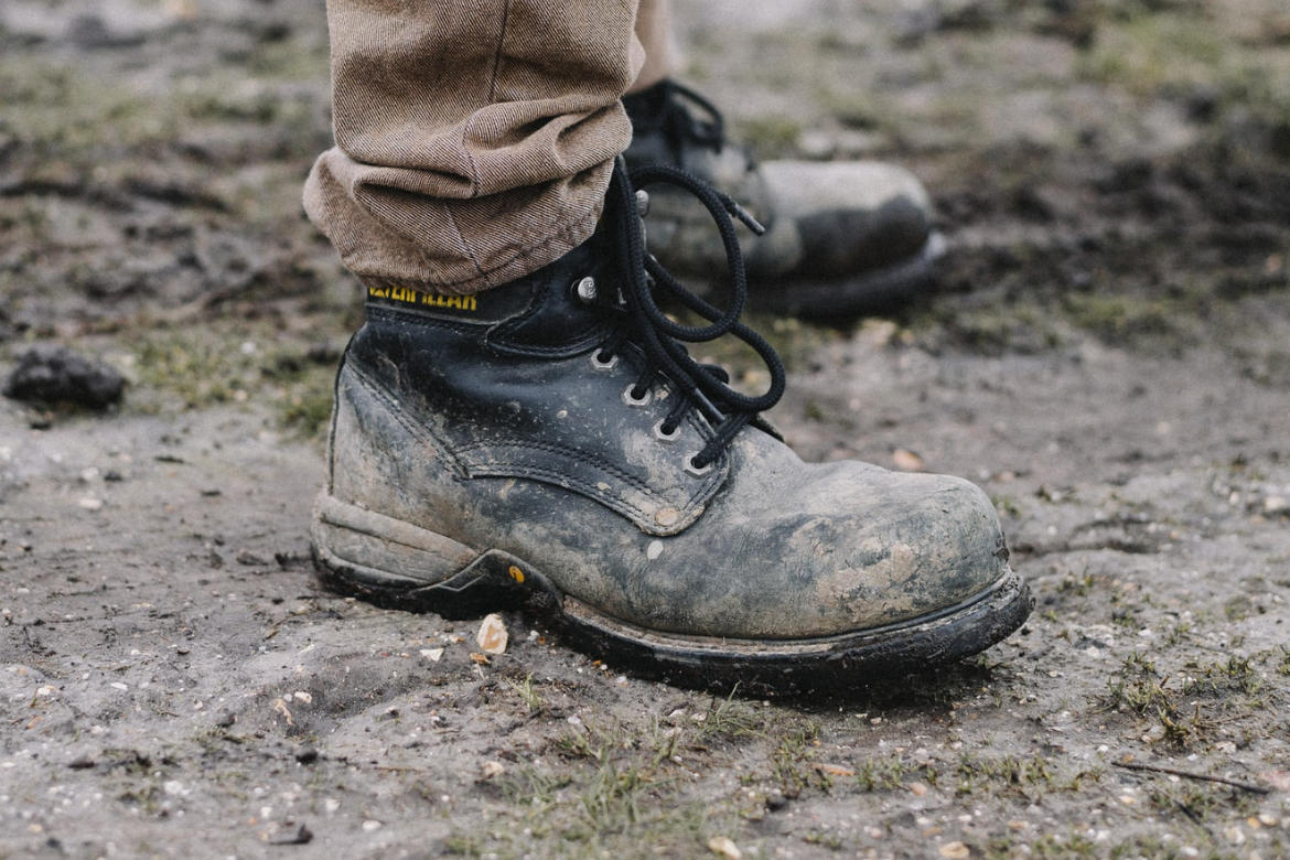 muddy safety boots