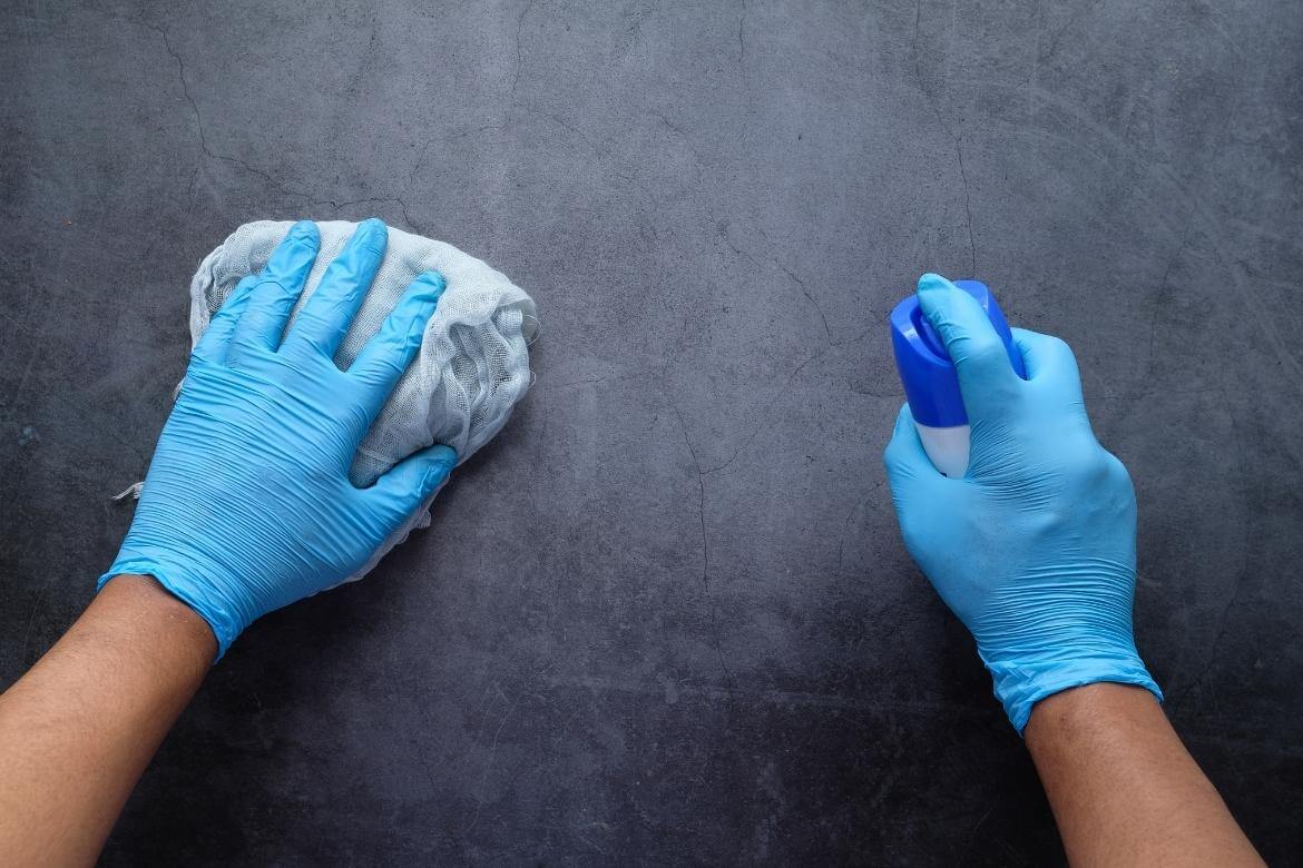 spraying substance with gloves